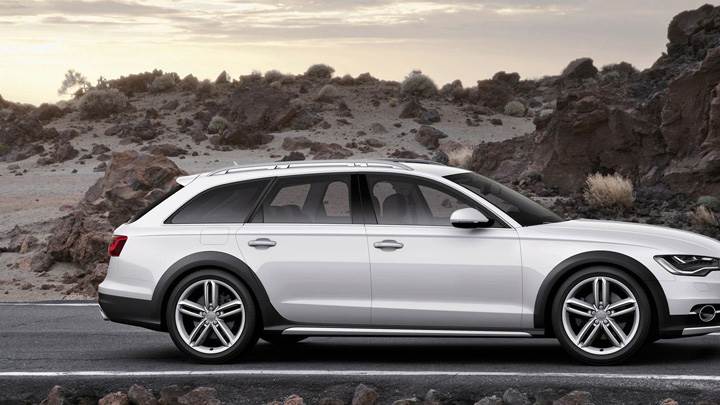 Side Pose Of Audi A6 Allroad 2013 In White